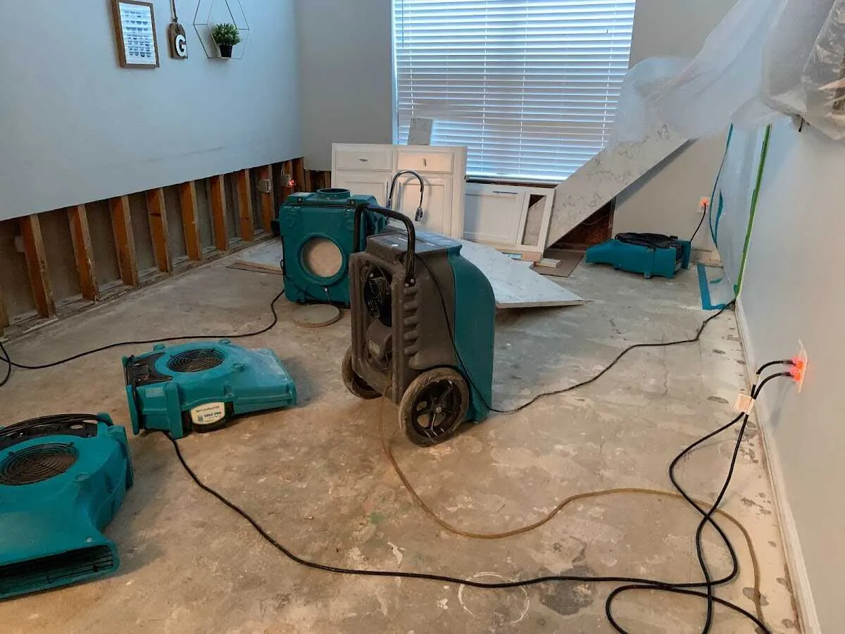 Dehumidifier in flood-cut room for Water Damage Restoration in West Lealman
